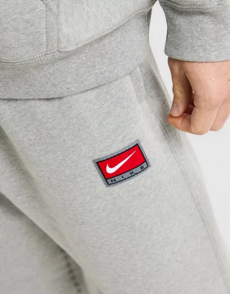 Nike Nohavice  M Nl Solo Swsh Bb Oh Pant Gfx