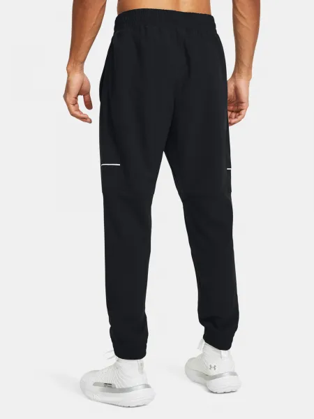 Čierne športové nohavice Under Armour UA Baseline Woven Pant