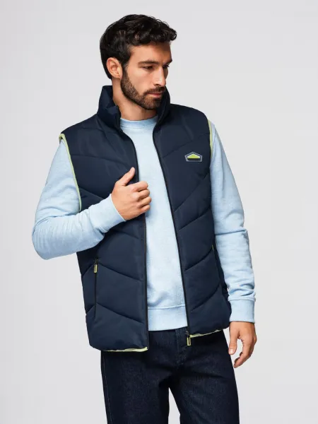 Ombre Men's quilted sleeveless jacket with neon accents - navy blue