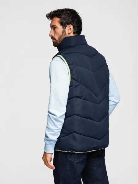Ombre Men's quilted sleeveless jacket with neon accents - navy blue