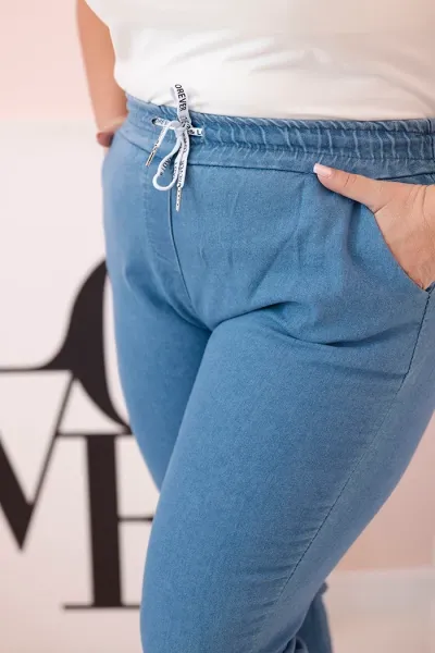 Legínovo Dámske bavlnené nohavice Plus Size s elastickým pásom a viazaním svetlo džínsové Farba: Svetlo modrá
