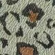 Pružný poťah s leopardím vzorom na stoličku