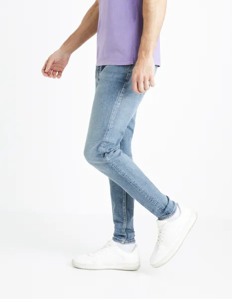 Svetlomodré pánske skinny fit džínsy Celio Foskinny1